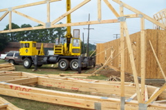 Roof truss built to provide storage space